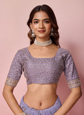 Alluring looking purple colour saree